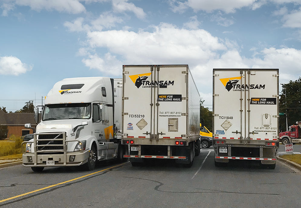 Transam Carriers' trucks on the road